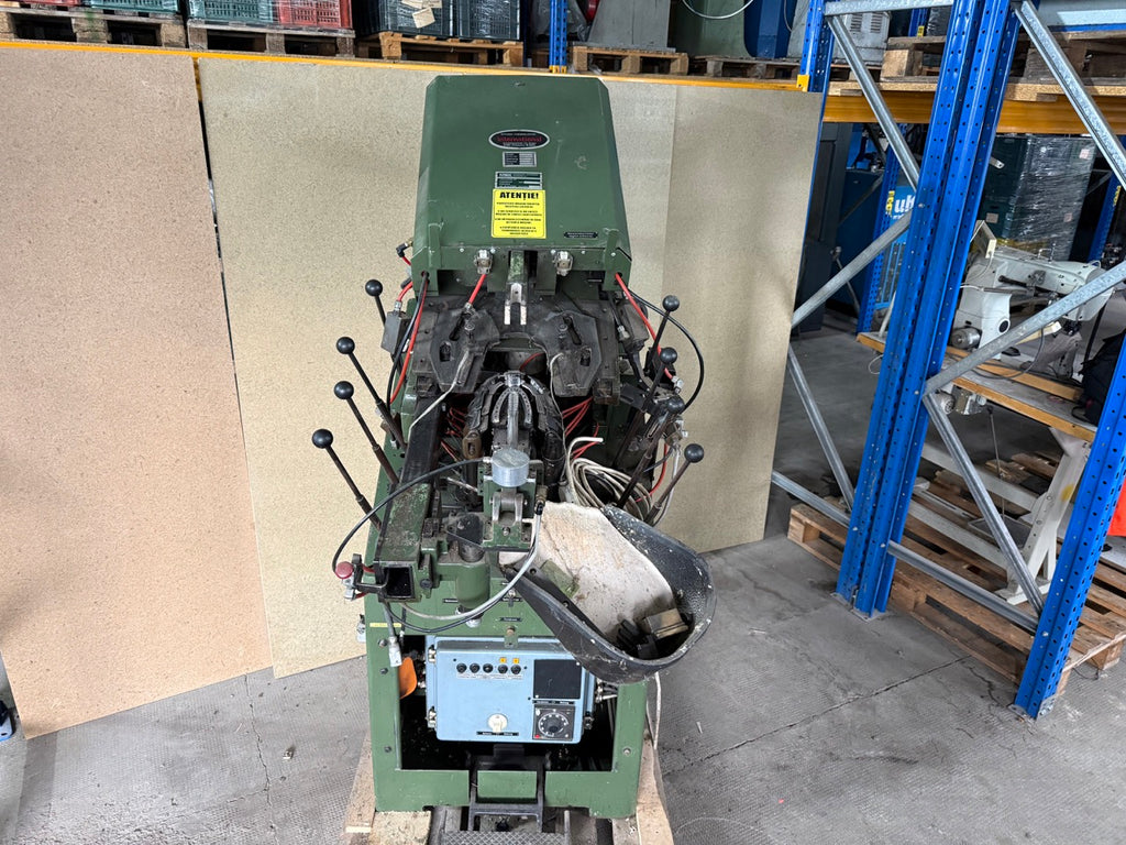 International toe lasting machine