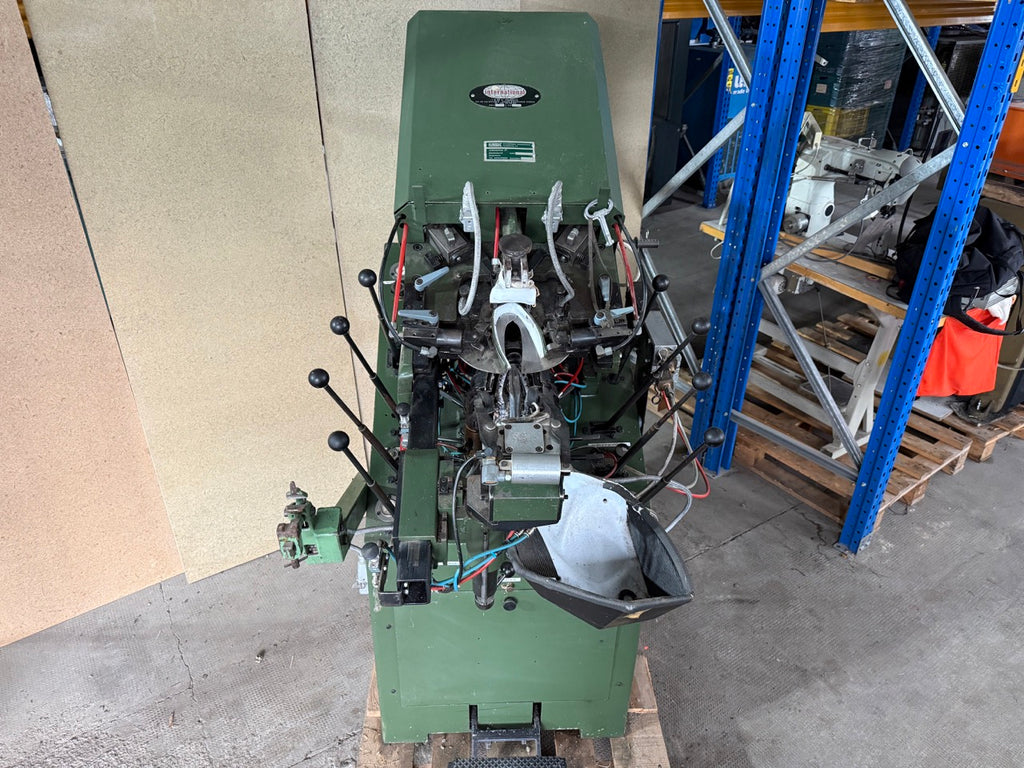 International toe lasting machine
