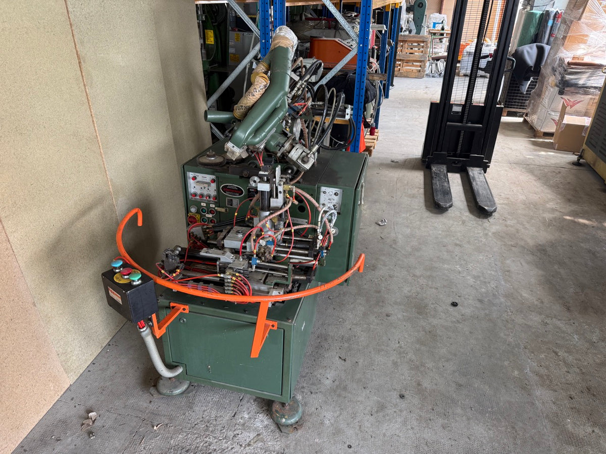 International AR-C automatic bottom roughin machine
