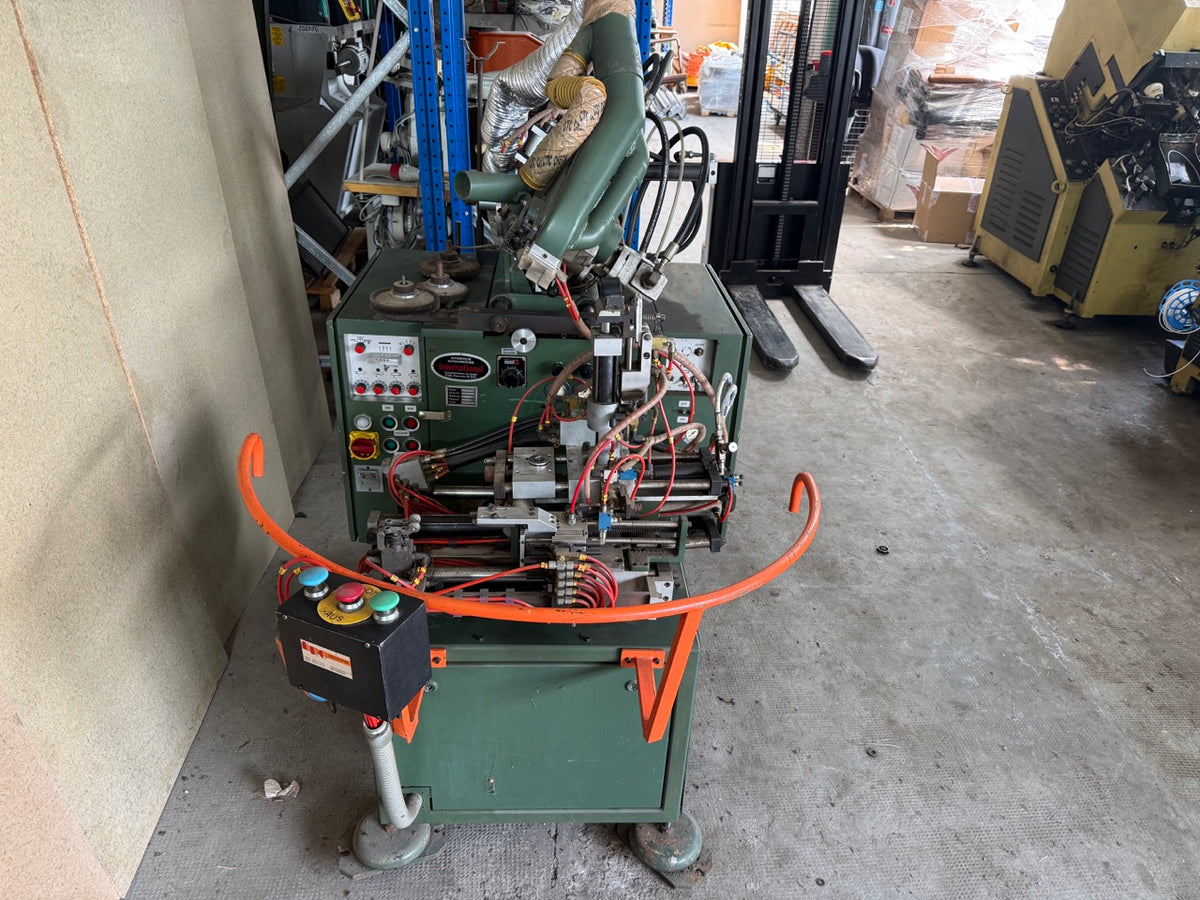 International AR-C automatic bottom roughin machine